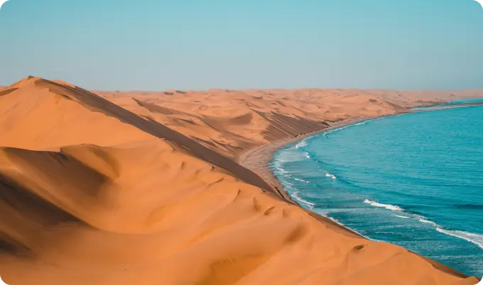 Sand dunes next to the sea